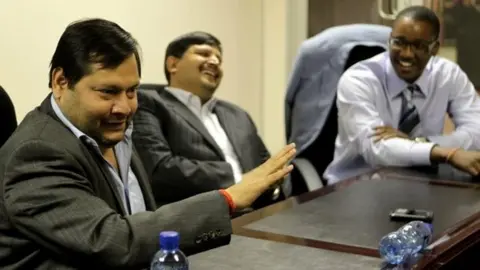 Getty Images Ajay and Atul Gupta, and Sahara director, Duduzane Zuma