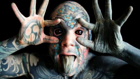 France's most tattooed man told not to teach nursery children - BBC News