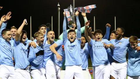 Man City players celebrate