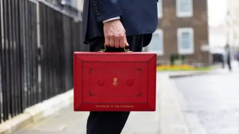 Treasury  man-holding-red-briefcase.