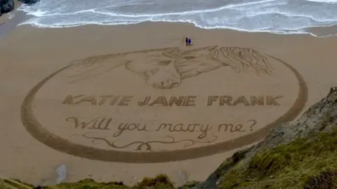 Wales News Service The sand art