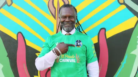 Bristol Rovers Community Trust Levi Roots wearing one of the new shirts