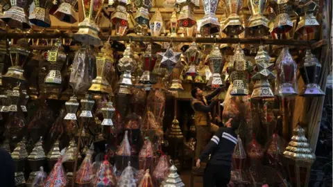 KHALED ELFIQI/EPA Traditional 'Fanous' lanterns are displayed in a market in Cairo, Egypt, 04 March 2024