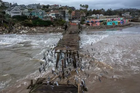 Getty Images The pier in Capitola, built in 1857, was torn in half