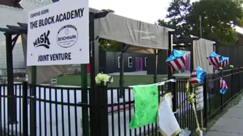 CBS A memorial has been erected at the scene of the shooting