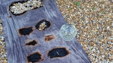 Essex Fire and Rescue Service holes in a towel