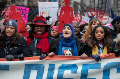 Getty Images Women at march