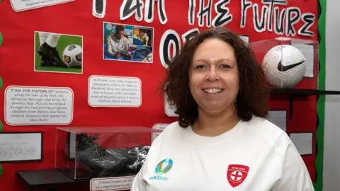 PA Media Emma Roberts, headteacher of Button Lane Primary School in Wythenshawe