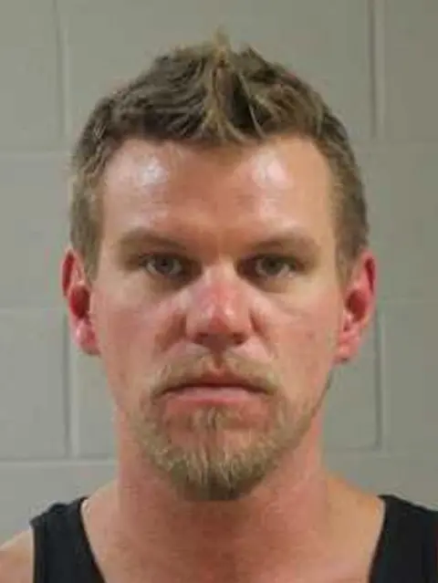 Purgatory Correctional Facility An image of Matthew Lawrence who uses the name EA Koetting, taken in a US prison