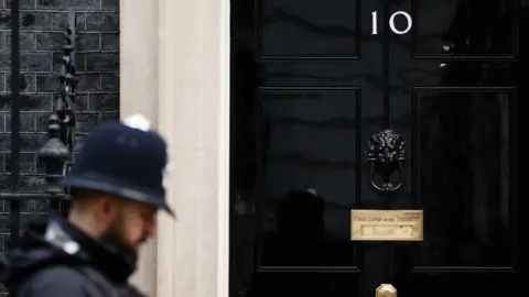 Getty Images A police officer outside No 10