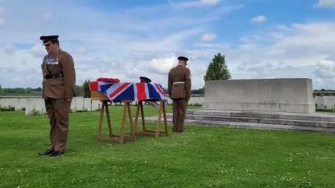 UK MOD Crown copyright / PA wire Pte Malcolm being guarded by officers of the Royal Army Medical Corps before burial on Wednesday at the Bedford House Cemetery in Ypres, located in Flanders Field