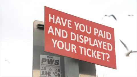 Changes in how to pay for some parking and who enforces fines have come into effect in parts of Northern Ireland this week