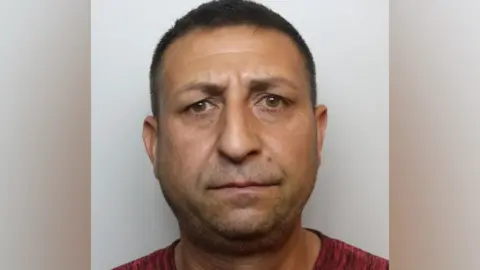 Wiltshire Police Ciobanica police shot, looking at the camera wearing a red t-shirt