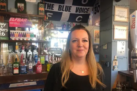 Jonathan Park/BBC Landlady Michelle Gargate said the club and her pub were intertwined.