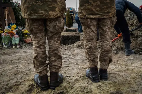 Kotenko was buried alongside Kyrylo Moroz, who also could not be taken home