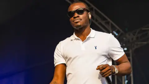 Getty Images Sneakbo performs at The Ends Festival, Croydon, in 2019