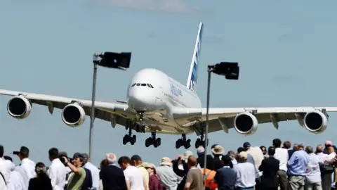EPA/ANDY RAIN The Airbus A380 landing at Farnborough Airport in 2014