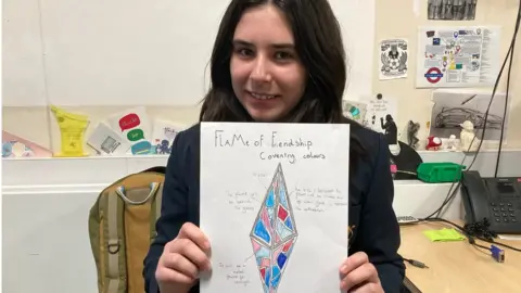 BBC Hester holding her design