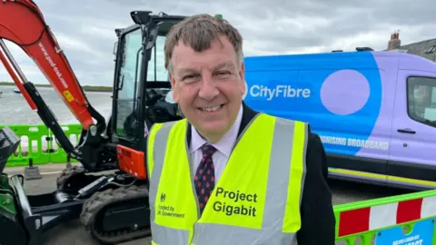 Qays Najm/BBC John Whittingdale