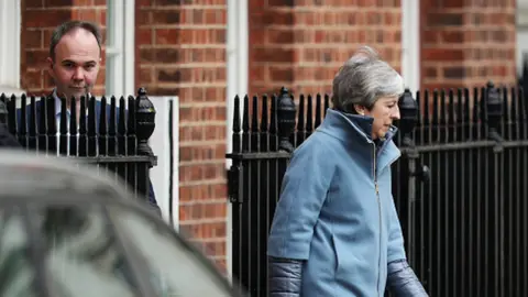 Getty Images Lord Barwell and Theresa May