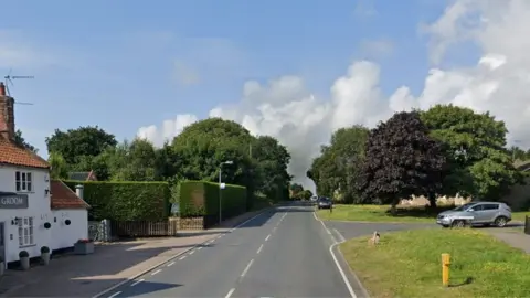 Google A12 in Wrentham, with Walker Gardens junction on right