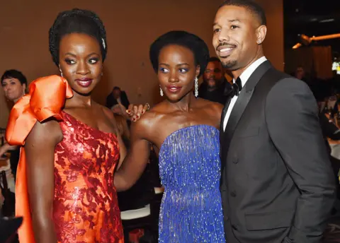 Getty Images Danai Gurira, Lupita Nyong'o and Chadwick Boseman attend the Golden Globe Awards in Los Angeless, the US - Sunday 6 January 2019