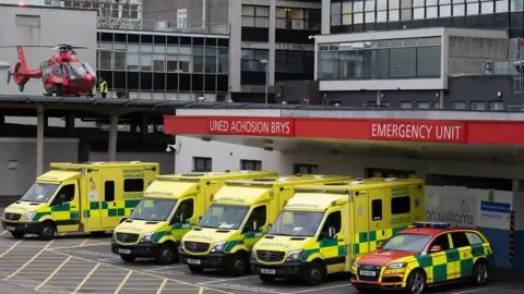 Getty Images Ambulances outside a hospital