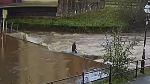 Marine Accident Investigation Branch CCTV image of the Salty Dog owner sliding down the fish pass at the town weir