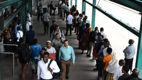 Getty Images Queues at Tanzania's border