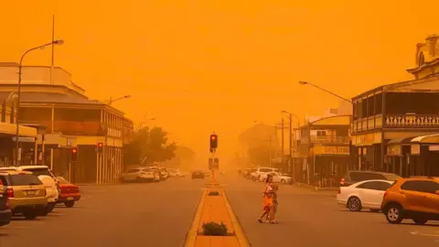 MATT WHITELUM A main street in Broken Hill turned orange by a dust storm