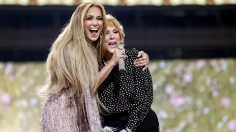 Getty Images Jennifer Lopez joined by her mother at the Vax Live event