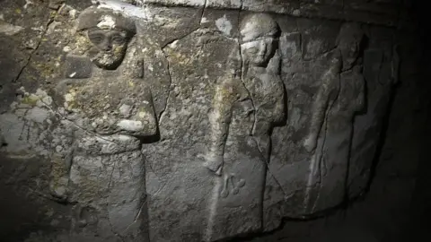 Getty Images Treasures found inside tunnels dug by IS at Nebi Yunus