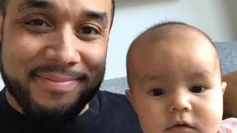 Stephen Booth Luke Skeete with his daughter Violet