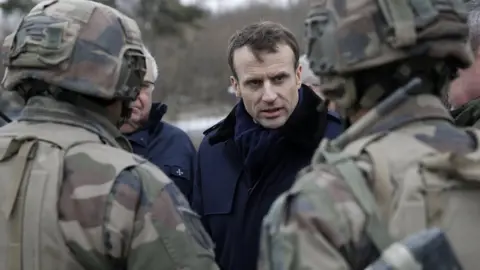 EPA Emmanuel Macron meeting French forces