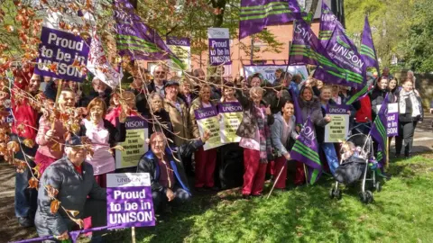 Unison UNISON members holding a lobby outside the Trust board meeting at the Royal Albert Edward Infirmary site in Wigan on 25 April