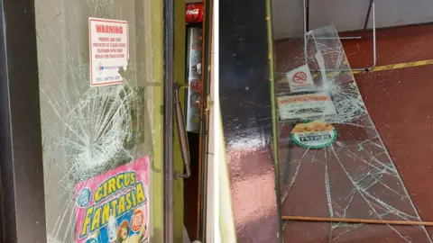 Nina Tteralli Smashed and broken doors at Small Fry takeaway