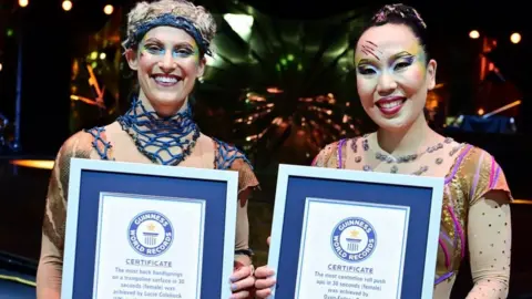 Guinness World Records Lucie Colebeck and Oyun-Erdene Senge hold world record certificates