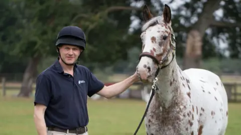 British Veterinary Association Dr Morley with horse freckles