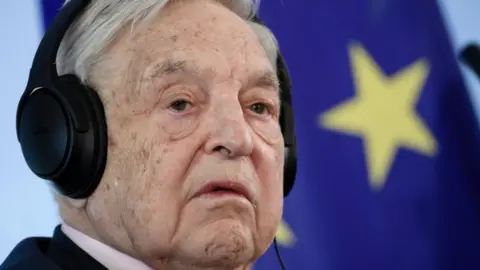 EPA The Chairman of the Open Society Foundations, George Soros, attends a press conference in Berlin, Germany, on 8 June 2017