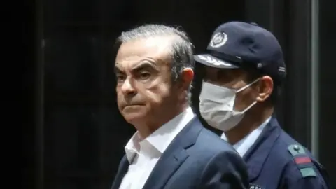 AFP Carlos Ghosn being released from jail on Thursday