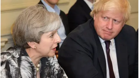 PA Theresa May and Boris Johnson