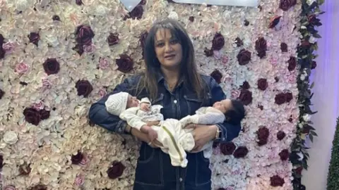 Pam Bassi Pam Bassi with her two grandchildren