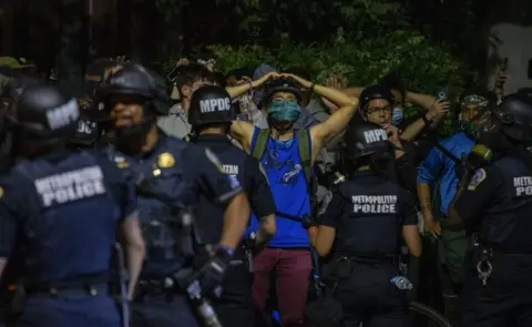 Getty Images Police detain protesters in Washington DC. Photo: 31 May 2020