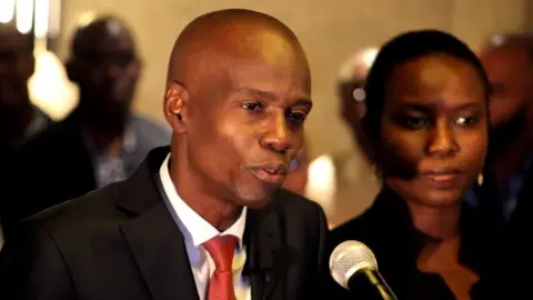 Reuters Jovenel Moise and his wife Martine Moise