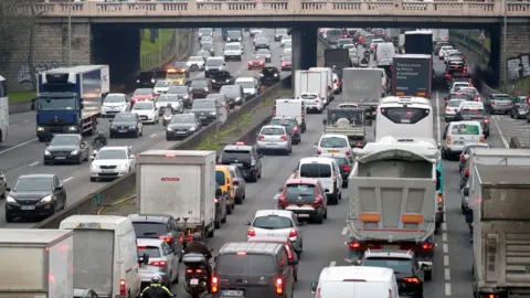 Reuters Rush hour traffic fills the ring road in Paris as a strike by French transportation workers continues on 6 December, 2019.