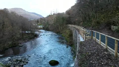 The newly opened path running alongside the river