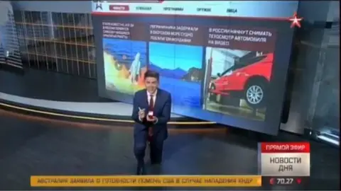 Zvezda News presenter gets down on one knee to propose