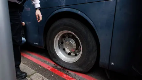 EPA A flat tyre on the coach