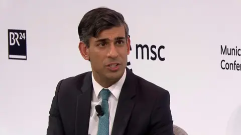 Rishi Sunak answers question at the Munich conference