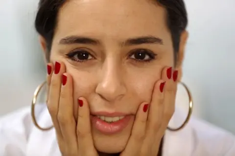 AFP Egyptian actress Sarrah Abdelrahman poses for a photo shoot during the 40th edition of the Cairo International Film Festival - 28 November 2018
